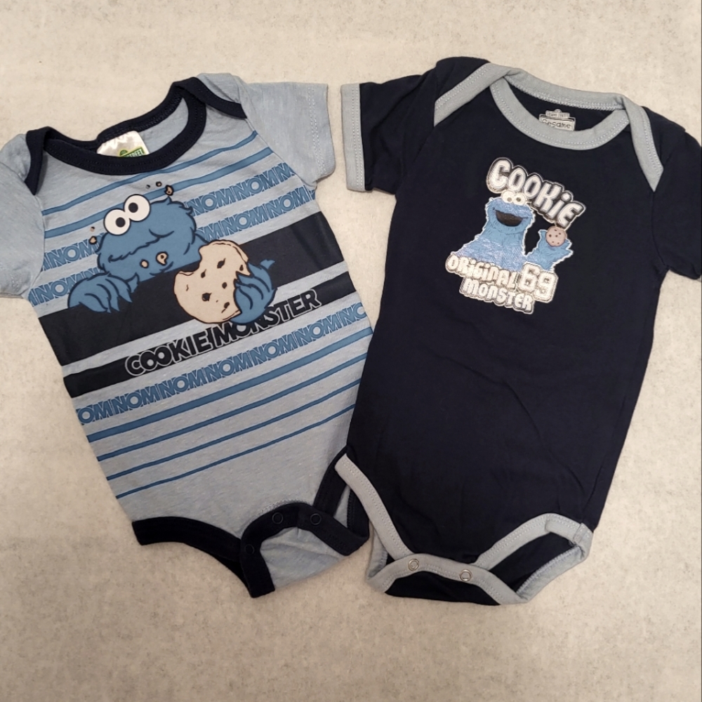 Two Sesame Street Cookie Monster onesies/bodysuits